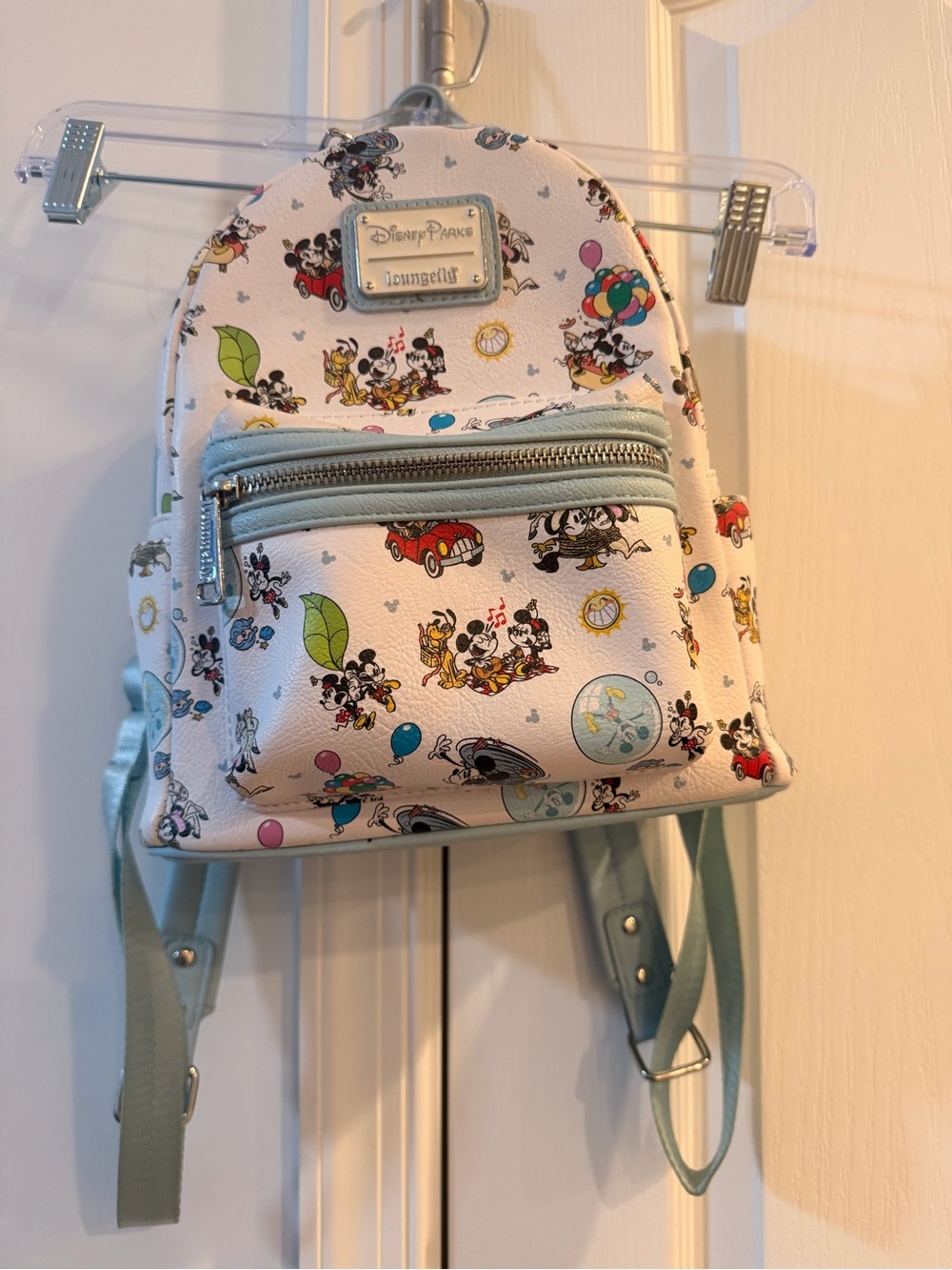 Loungefly White Mini Backpack with Light Blue Trim and Multicolor Disney Print